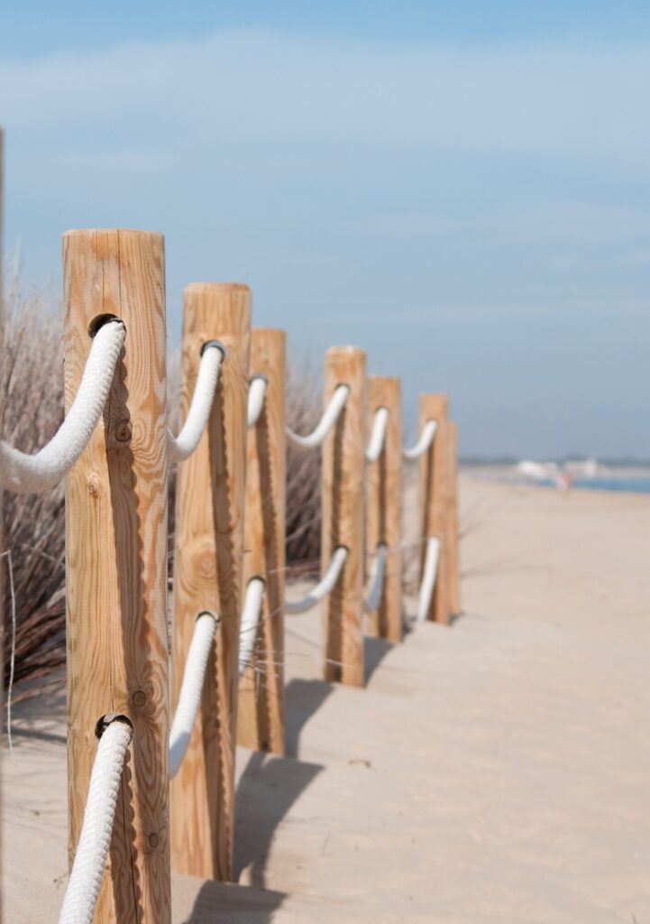 picture of a boundary fence on a beach